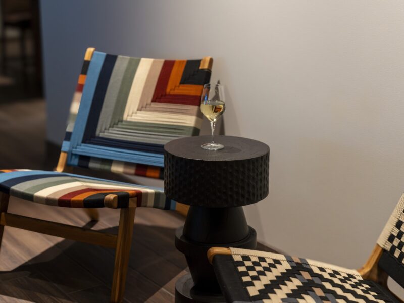 ANCJD Chairs and Wine Glass in Lobby low res