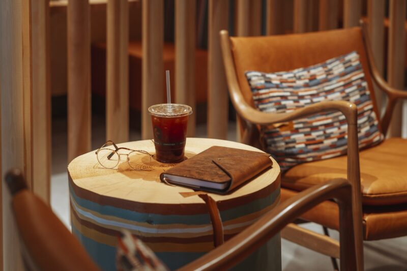Coffee on Table with Chairs Hotel Lobby